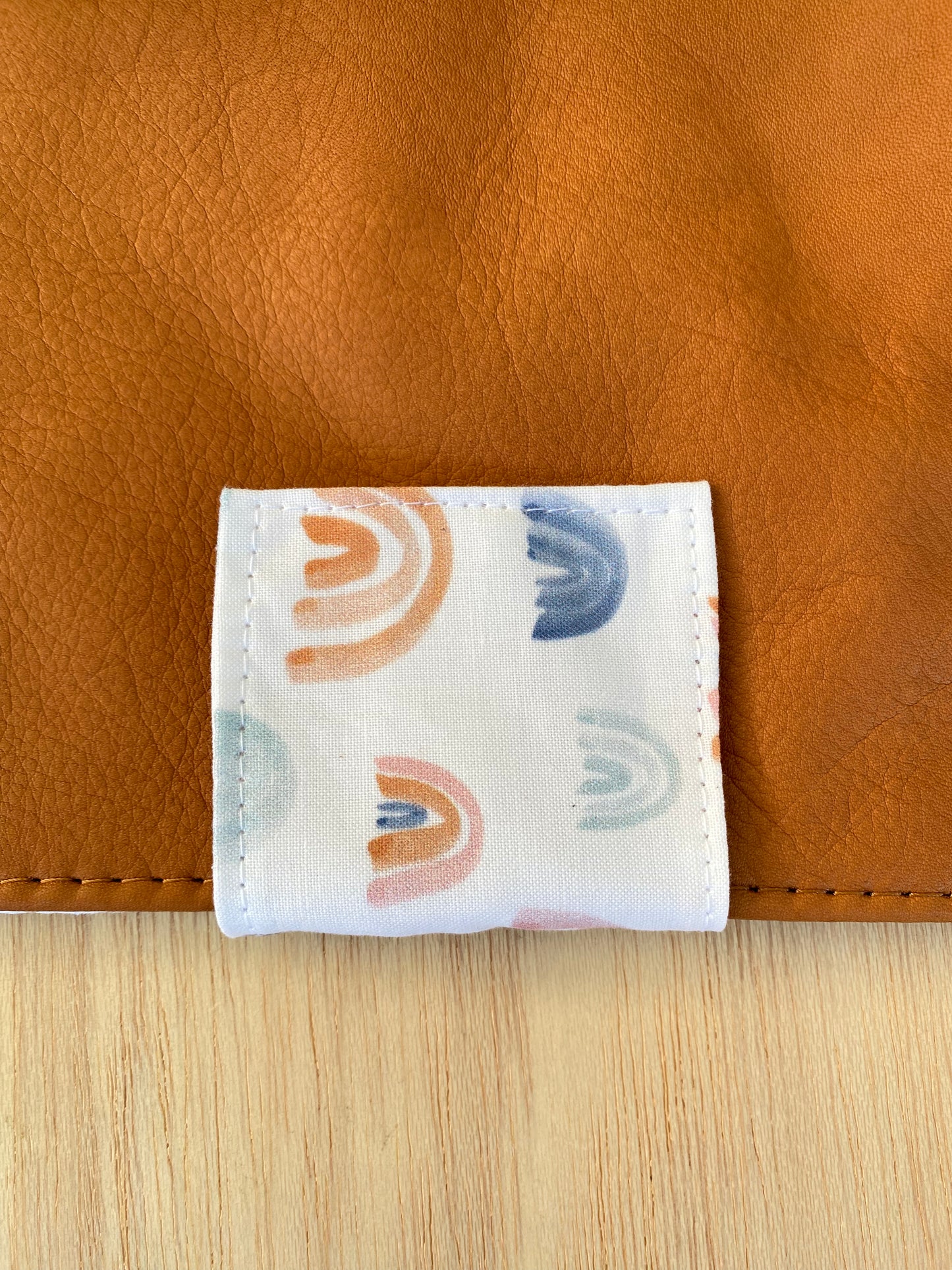Leather nappy wallet - Watercolour rainbow on tan leather