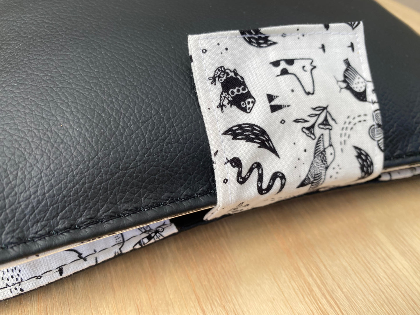 Leather Nappy Wallet - animals on black leather